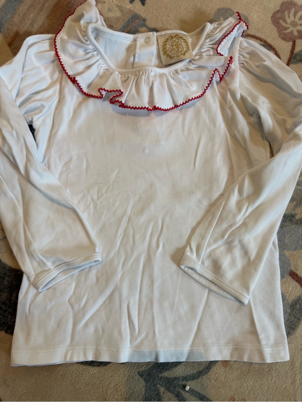 Kids Long-Sleeve White Top with Red-Trim Ruffle Collar